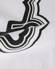 Close-up of a white Pima cotton fabric with a bold, black abstract design, featuring smooth curves and sharp angles. The focus is on the texture of the material and the contrast of the design in the Psycho Bunny MENS MAYBROOK GRAPHIC TEE - B6U130B2TS.