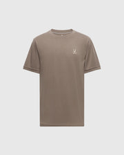 The MENS ALEXANDER FASHION TEE - B6U139E200 by Psycho Bunny is an exquisite men's Pima cotton T-shirt in plain brown. It showcases a small embroidered bird logo on the upper left chest area. Set against a light backdrop, this tee represents premium quality men's fashion with its elegant simplicity.