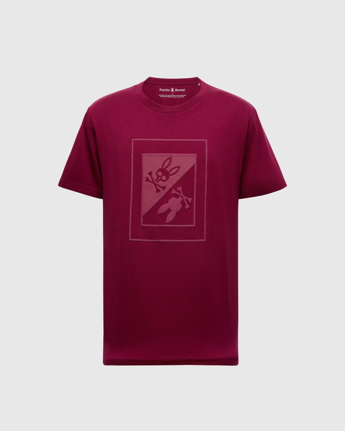 Introducing the Psycho Bunny Men's Dotsero Graphic Tee (B6U197E200), a stylish maroon tee adorned with a subtle graphic print at the center. This design features abstract shapes incorporating scissors and a rabbit, made from soft pima cotton. It sports a classic crewneck style against a plain white background.