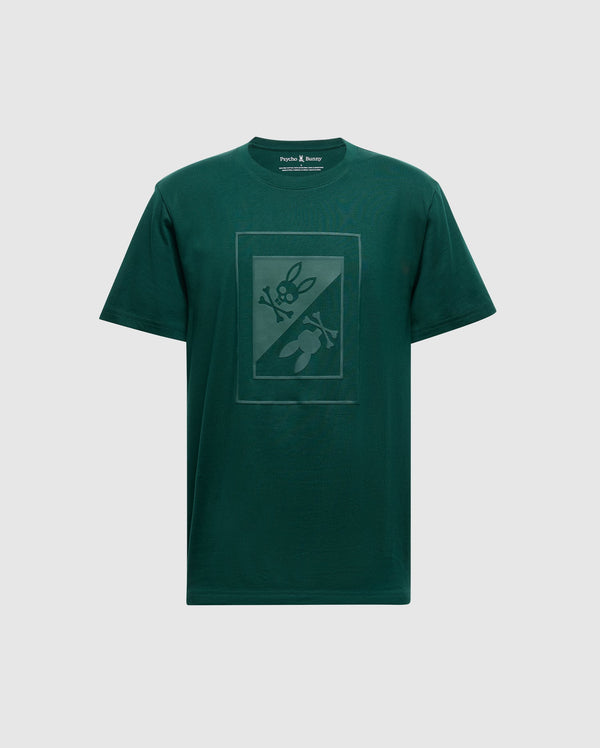 The Psycho Bunny Men's Dotsero Graphic Tee (B6U197E200) in green features a distinctive rectangular design on the front, highlighting a subtle graphic of a knife and bunny with crossed bones. It is crafted from soft Peruvian Pima Cotton for ultimate comfort.