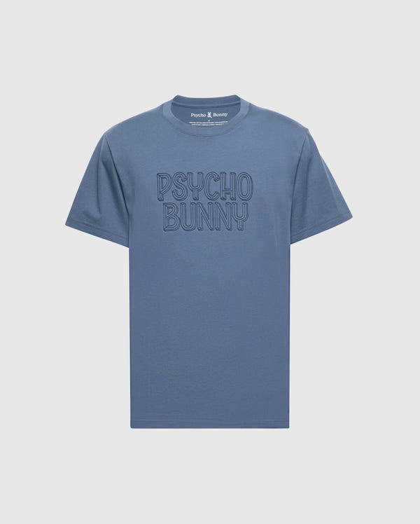 MENS MONARC WORDMARK GRAPHIC TEE - B6U210E200 in blue, featuring "Psycho Bunny" in large, stylized letters on the front. This tee offers a comfortable crew neckline and short sleeves.