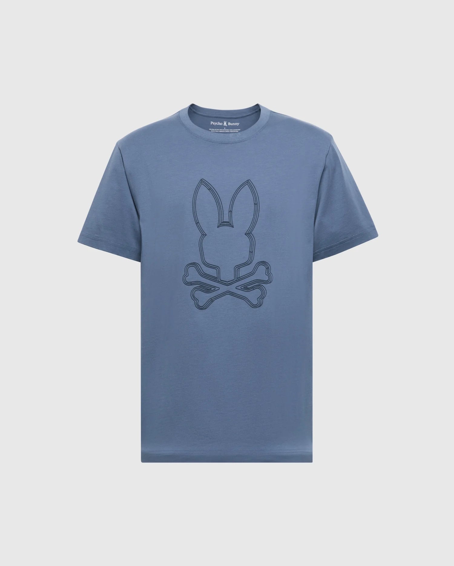 The Psycho Bunny MENS MONARC FRONT BUNNY GRAPHIC TEE - B6U211E200 is a blue Pima cotton T-shirt featuring a minimalist rabbit head design above crossed bones in a darker hue, embodying simplicity and casual style ideal for everyday wear.