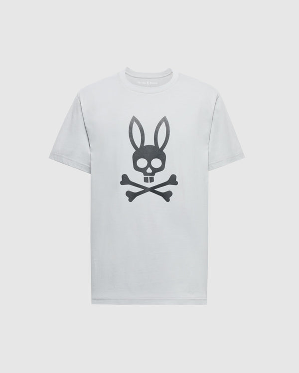 The Psycho Bunny MENS PAYSON LEATHER PRINT GRAPHIC TEE (B6U213E200) features a black skull and crossbones with bunny ears design on white Pima cotton, creating a striking look against the plain background.