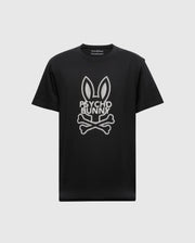 The MENS DUMON GRAPHIC TEE - B6U271E200 by Psycho Bunny features a premium Peruvian Pima Cotton design emblazoned with the brand's signature logo, depicting bunny ears above crossed bones on the front.