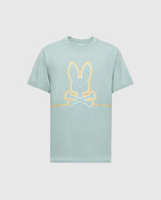 The MENS DACANO FRONT GRAPHIC TEE - B6U314E200 by Psycho Bunny, features a stylized graphic with bunny ears above crossed bones outlined in orange, centered on the front of a light green, regular fit shirt. This comfort-forward design stands out against a plain white background.