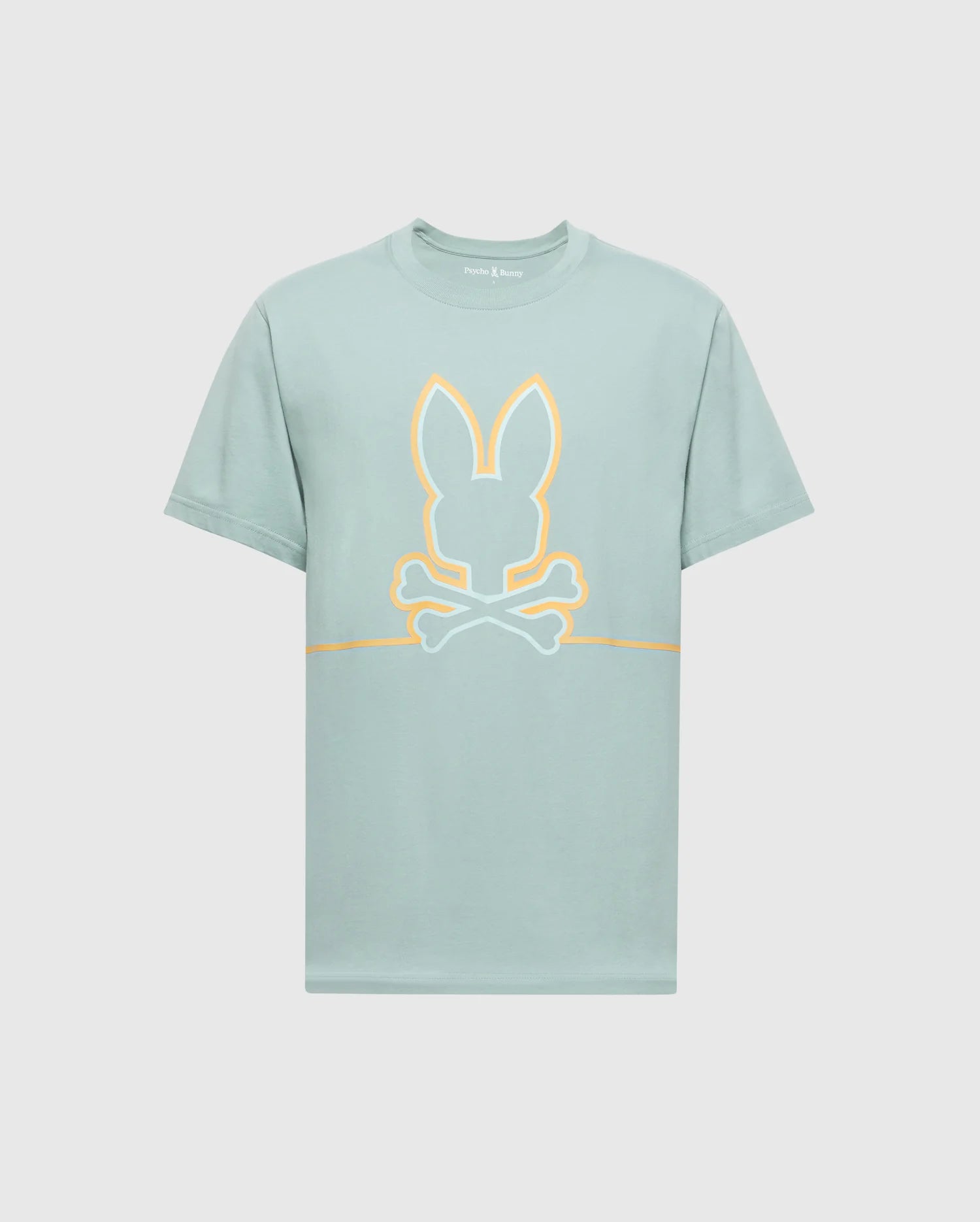 The MENS DACANO FRONT GRAPHIC TEE - B6U314E200 by Psycho Bunny, features a stylized graphic with bunny ears above crossed bones outlined in orange, centered on the front of a light green, regular fit shirt. This comfort-forward design stands out against a plain white background.