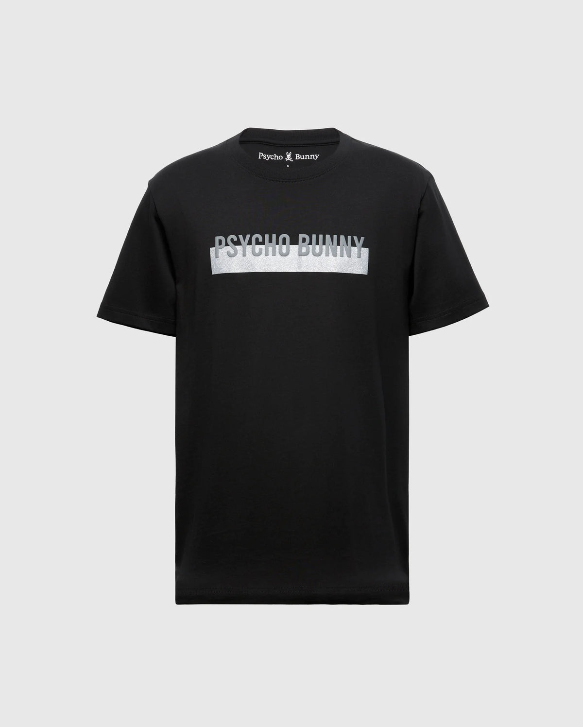 The MENS BROOKPORT GRAPHIC TEE - B6U362E200 by Psycho Bunny is a men's black T-shirt made from premium Pima cotton, showcasing the distinctive "Psycho Bunny" logo across the chest in light lettering. It is set against a plain gray backdrop.