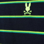 Close-up of a dark blue heavyweight jersey knitted fabric with horizontal green and teal stripes, featuring a neon green embroidered emblem of a rabbit skull and crossbones in between the 90s-inspired two-tone stripes. This is the MENS ALTON STRIPE OVERSIZED TEE - B6U409C200 from Psycho Bunny.