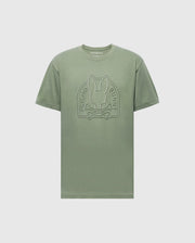 The Mens Melbourne Graphic Tee by Psycho Bunny features a large rabbit with crossbones emblem and "Psycho Bunny" text on the front. It's eco-friendly, crafted from Peruvian Pima cotton, in green with a light gray background.