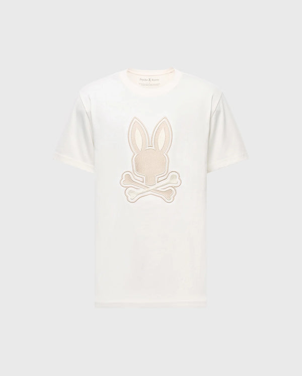 Check out the Psycho Bunny MENS NEW CASTLE GRAPHIC TEE, B6U415F200. This white Pima cotton T-shirt features an embroidered bunny head with ears and crossed bones in light beige, elegantly centered on the front.
