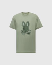 Explore the Psycho Bunny Mens New Castle Graphic Tee (B6U415F200) in green, made from luxurious Pima cotton, featuring a distinctive embroidered bunny skull and crossbones design on the front for an edgy touch.