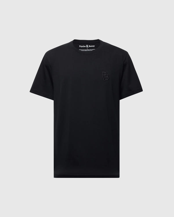 The Psycho Bunny MENS NICHOLSON PB CHEST GRAPHIC TEE - B6U416F200 is a black, regular fit T-shirt made from soft Pima cotton. It features subtle embroidered "PB" initials on the upper left and is displayed against a light gray background.