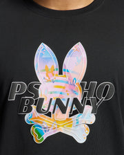 Close-up of the MENS MILOS GRAPHIC TEE by Psycho Bunny, a black shirt made from luxurious Peruvian Pima cotton. It features a colorful Bunny graphic above crossed bones, with "PSYCHO BUNNY" in stylized letters and an abstract, vibrant design for a playful touch.