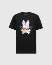 The MENS MILOS GRAPHIC TEE - B6U456F200 by Psycho Bunny is a black T-shirt made from soft Peruvian Pima cotton, showcasing a space-age graphic with a holographic bunny skull and crossbones design.