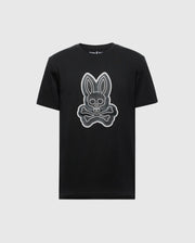 The MENS SYDNEY GRAPHIC TEE (B6U508F200) by Psycho Bunny is a black, regular fit T-shirt. Crafted from soft Pima cotton, it features a vivid white outlined cartoon bunny head with long ears and teeth above crossed bones on a plain white background.