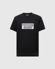 The MENS SYDNEY WORDMARK GRAPHIC TEE - B6U510F200 by Psycho Bunny is a black Pima cotton T-shirt with a chest white patch featuring "PSYCHO BUNNY" in bold, outlined letters, offering a sleek and stylish touch.