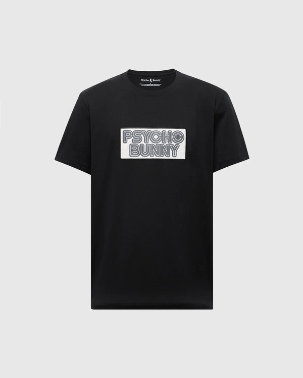 The MENS SYDNEY WORDMARK GRAPHIC TEE - B6U510F200 by Psycho Bunny is a black Pima cotton T-shirt with a chest white patch featuring "PSYCHO BUNNY" in bold, outlined letters, offering a sleek and stylish touch.