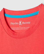 Close-up of a neckline of a red Psycho Bunny MENS BARRETT RELAXED FIT TEE - B6U518C200 made of 100% heavyweight Pima cotton, with the brand's logo and manufacturing details printed on the inside neck. A blue trim is visible along the inner collar, providing a contrast to the red fabric. The relaxed fit adds extra comfort.