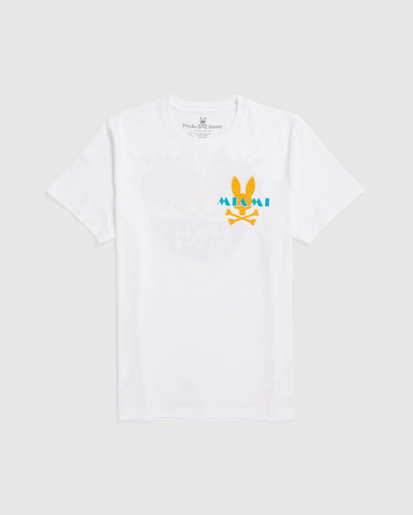A Psycho Bunny MENS MIAMI TEE - B6U550W1PC made from soft Pima cotton, featuring a playful yellow bunny with sunglasses and the word "Miami" in blue and orange letters. Above the bunny, faint pastel graphics of palm trees and a sun can be seen in the background.