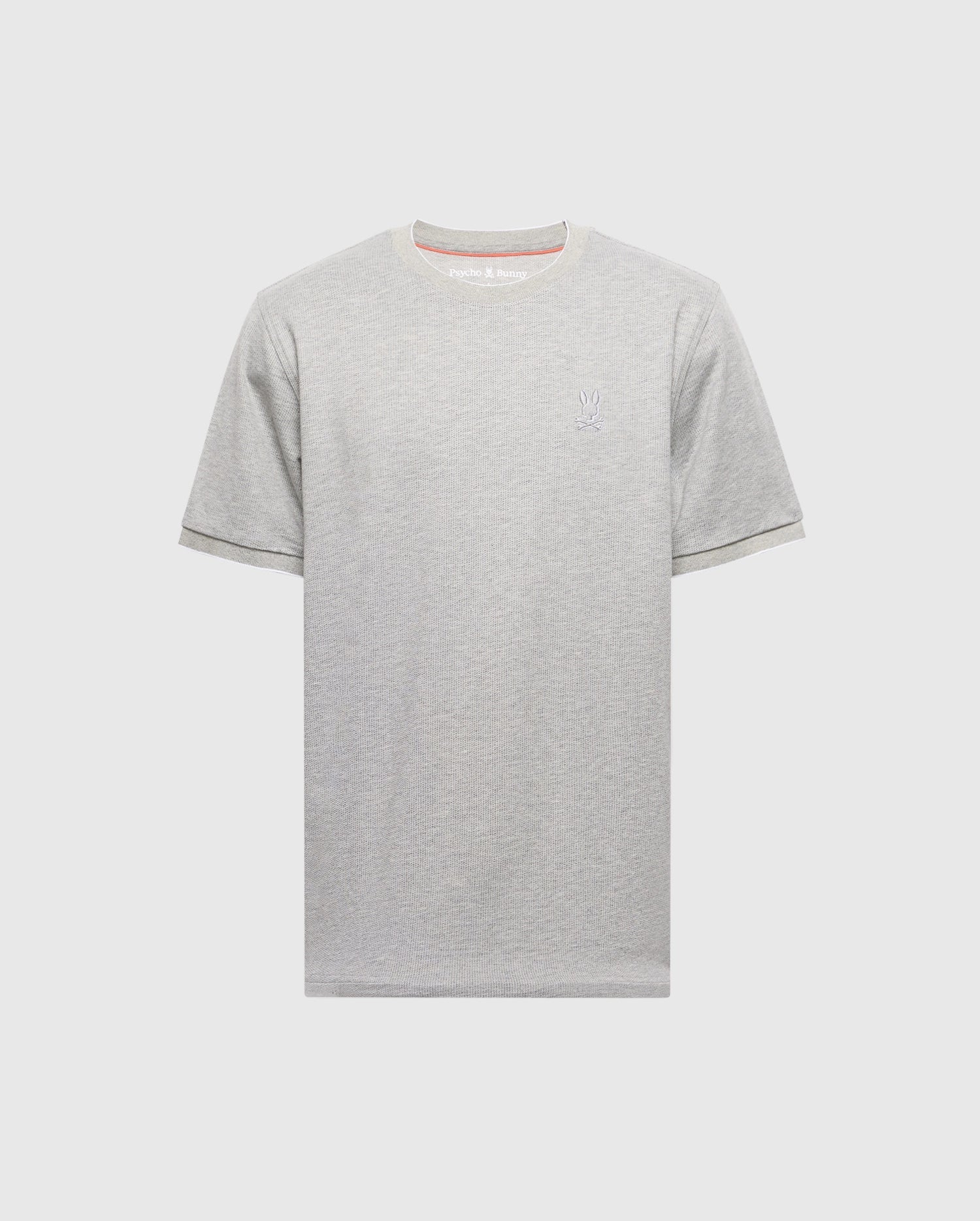 The MENS MACKAY JACQUARD FASHION TEE by Psycho Bunny is a gray Pima cotton T-shirt with short sleeves and an embroidered chest Bunny on the left, set against a plain white background.