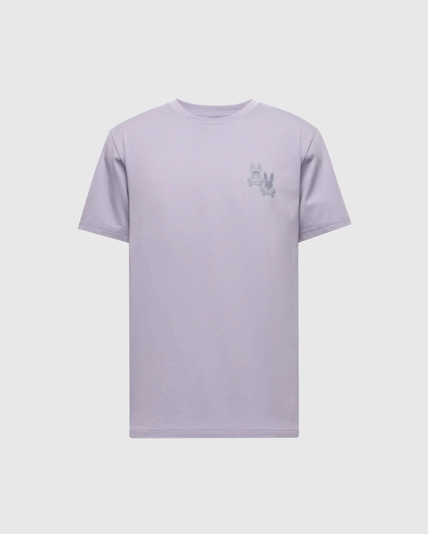 The Psycho Bunny MENS ELLIOT FRONT BACK GRAPHIC TEE - B6U605F200 is a regular fit light purple t-shirt made of soft Pima cotton. It features a small embroidery of two abstract open hands on the left chest and is displayed flat on a white background.