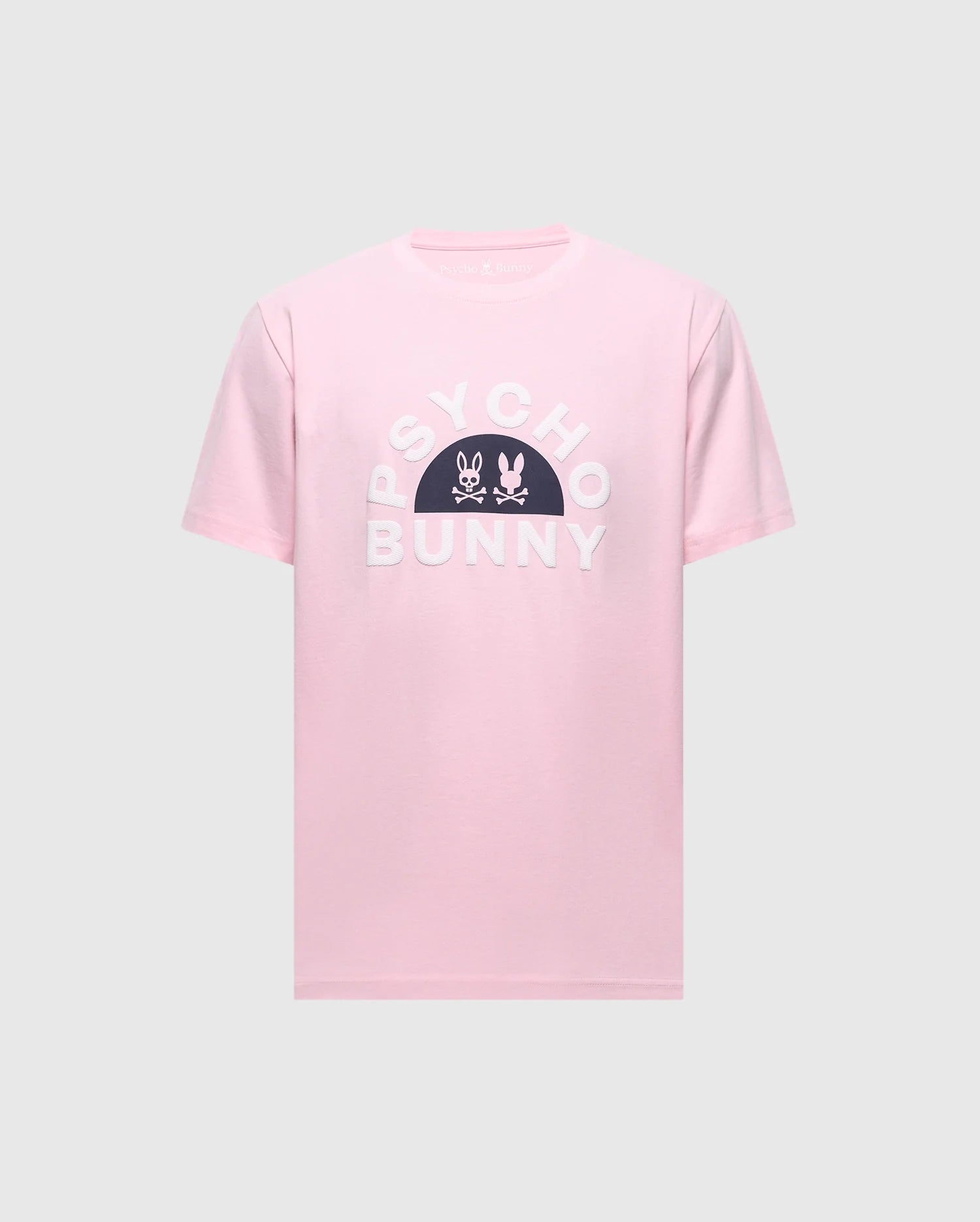Introducing the MENS GOLDIE GRAPHIC TEE by Psycho Bunny: A pink Pima Cotton tee with "PSYCHO BUNNY" in bold white letters and a black semi-circle displaying a striking Bunny Graphic with crossbones.
