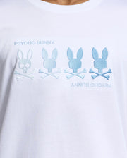 The MENS OCEANIA EMBROIDERED GRAPHIC TEE by Psycho Bunny is a white Pima cotton shirt featuring blue "Psycho Bunny" text with embroidered bunny silhouettes over crossed bones, offering retro vibes with a light-to-dark blue gradient effect.