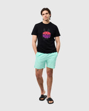 head to toe view of a male model wearing the pima cotton preston graphic tee in black