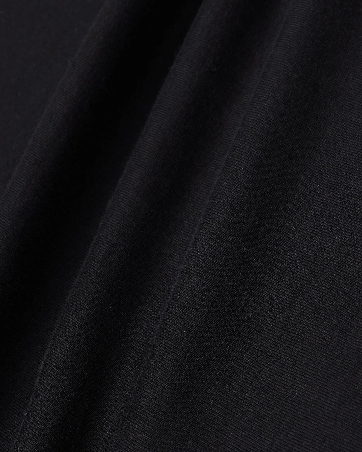 fabric detail of the pima cotton preston graphic tee in black