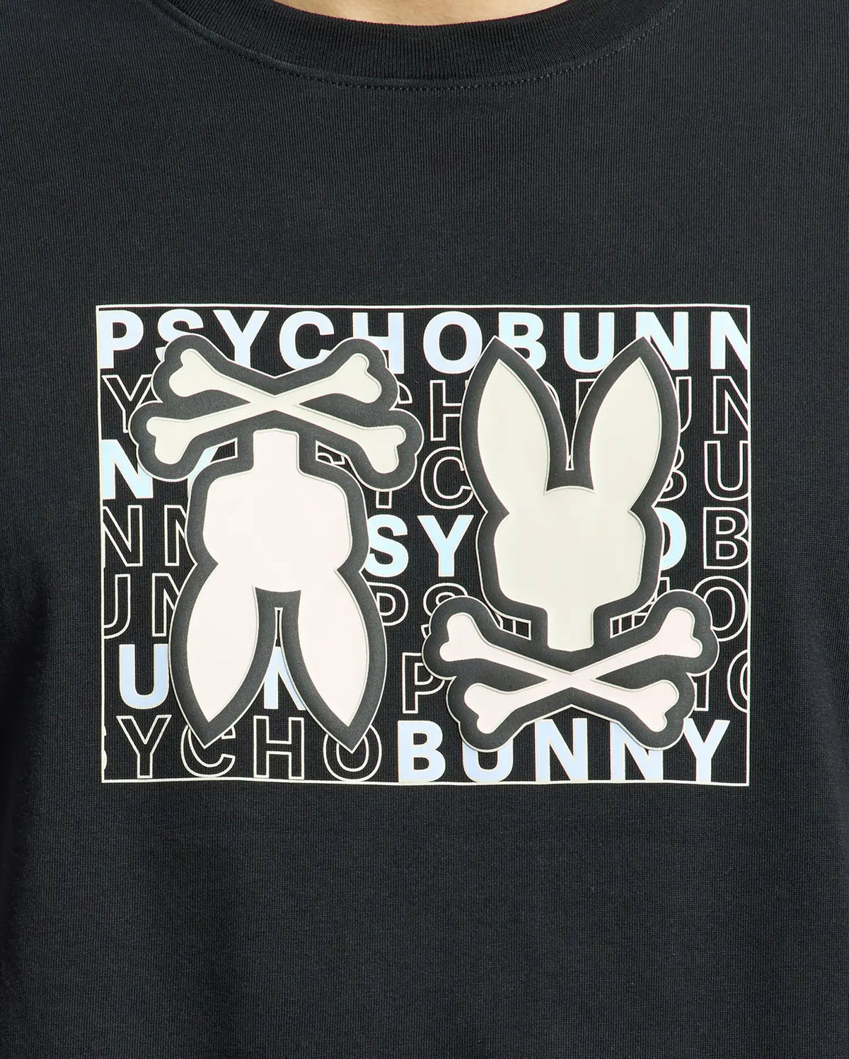The Psycho Bunny MENS GOLD COAST GRAPHIC TEE - B6U631F200, made from premium Pima cotton in a classic fit, features two stylized rabbit logos with crossbones and "PSYCHO BUNNY" in alternating black and white letters, combining unique design with exceptional craftsmanship.