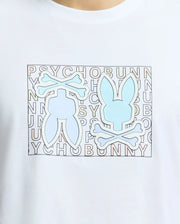 A close-up of the Psycho Bunny MENS GOLD COAST GRAPHIC TEE, B6U631F200, shows a light blue bunny with crossbones logo on white Pima cotton. The "PSYCHO BUNNY" text in a grid pattern emphasizes its premium craftsmanship.