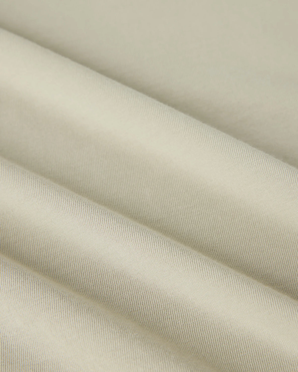 A close-up of an embroidered Mens Pearland Back Graphic Tee - B6U632C200 by Psycho Bunny.