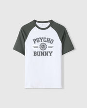 Introducing the Psycho Bunny Men's London Raglan Graphic Tee - B6U896D200, a stylish white and dark green T-shirt made from premium Pima cotton. It features "Psycho Bunny" prominently printed on the front in bold letters, combining the classic appeal of a varsity graphic with the durability of a heavyweight graphic tee.
