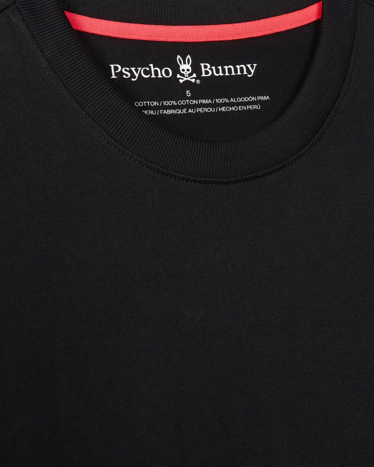 Close-up of a black MENS MONROE HEAVY WEIGHT RELAXED FIT TEE - B6U910D200 with a relaxed fit and red neckline. The logo of Psycho Bunny, featuring a stylized bunny skull and crossbones, is visible inside the collar area. Made of 100% Pima cotton.