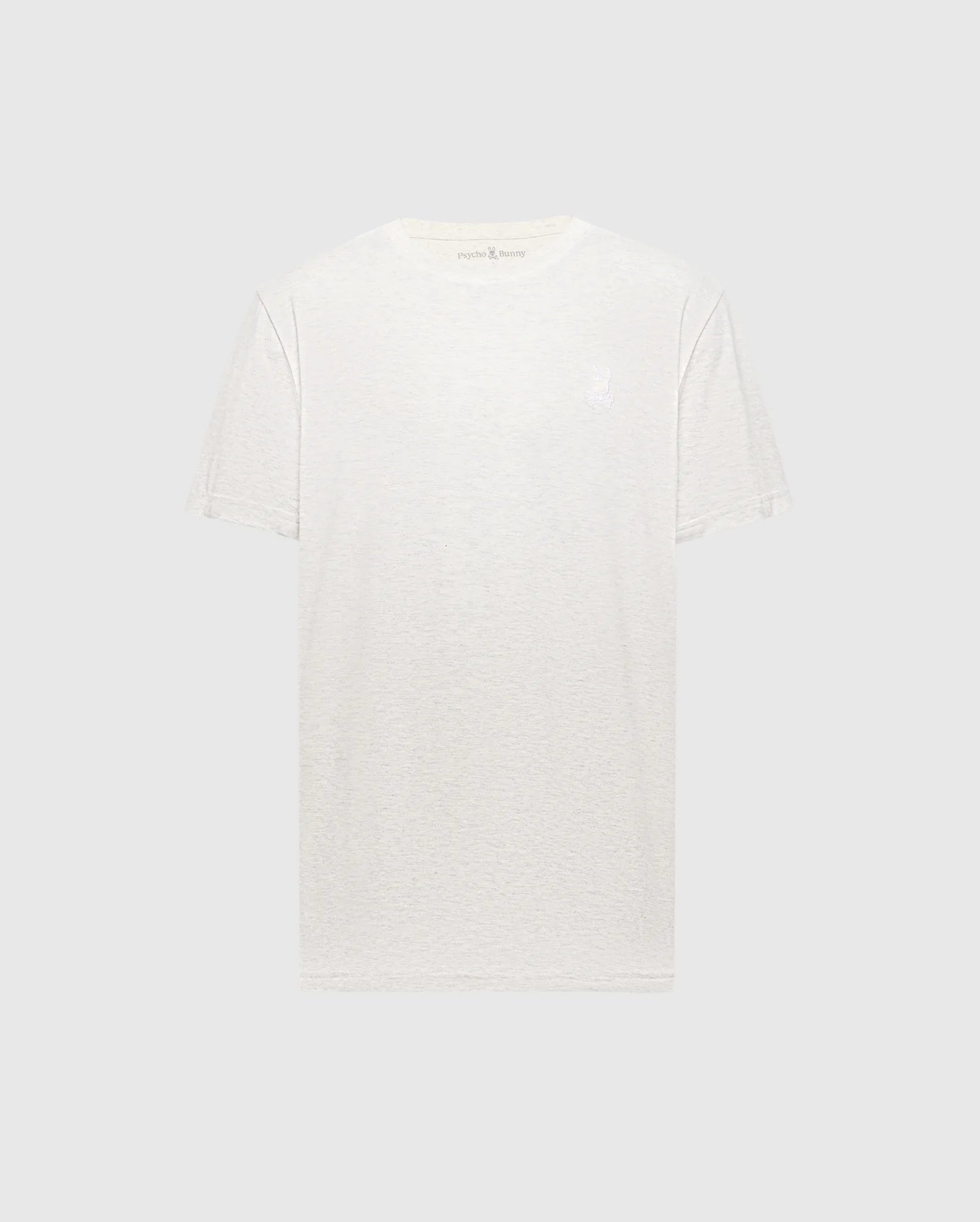 The Psycho Bunny Men's James Crew Neck Tee (B6U952D200) is a light gray, short-sleeve t-shirt made of soft Pima cotton. It features a minimal design with a subtle embroidered logo near the neckline on a white background.