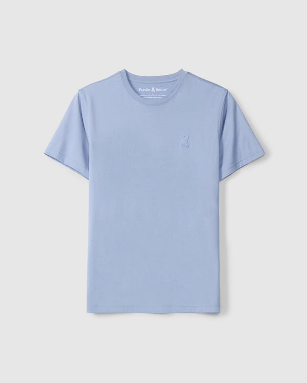 Light blue Psycho Bunny MENS JAMES PREMIUM CREW NECK TEE, crafted from Pima cotton and featuring short sleeves with a subtle embroidered logo on the left chest. This high-quality tee showcases a classic crew neck design, set against a simple light background.