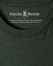 Close-up of the stylish MENS JAMES PREMIUM CREW NECK TEE - B6U952D200 in dark green, showcasing the "Psycho Bunny" label with a tonal outline bunny embroidered logo. Made from premium Pima cotton and crafted in Peru, this shirt is available in size 5.