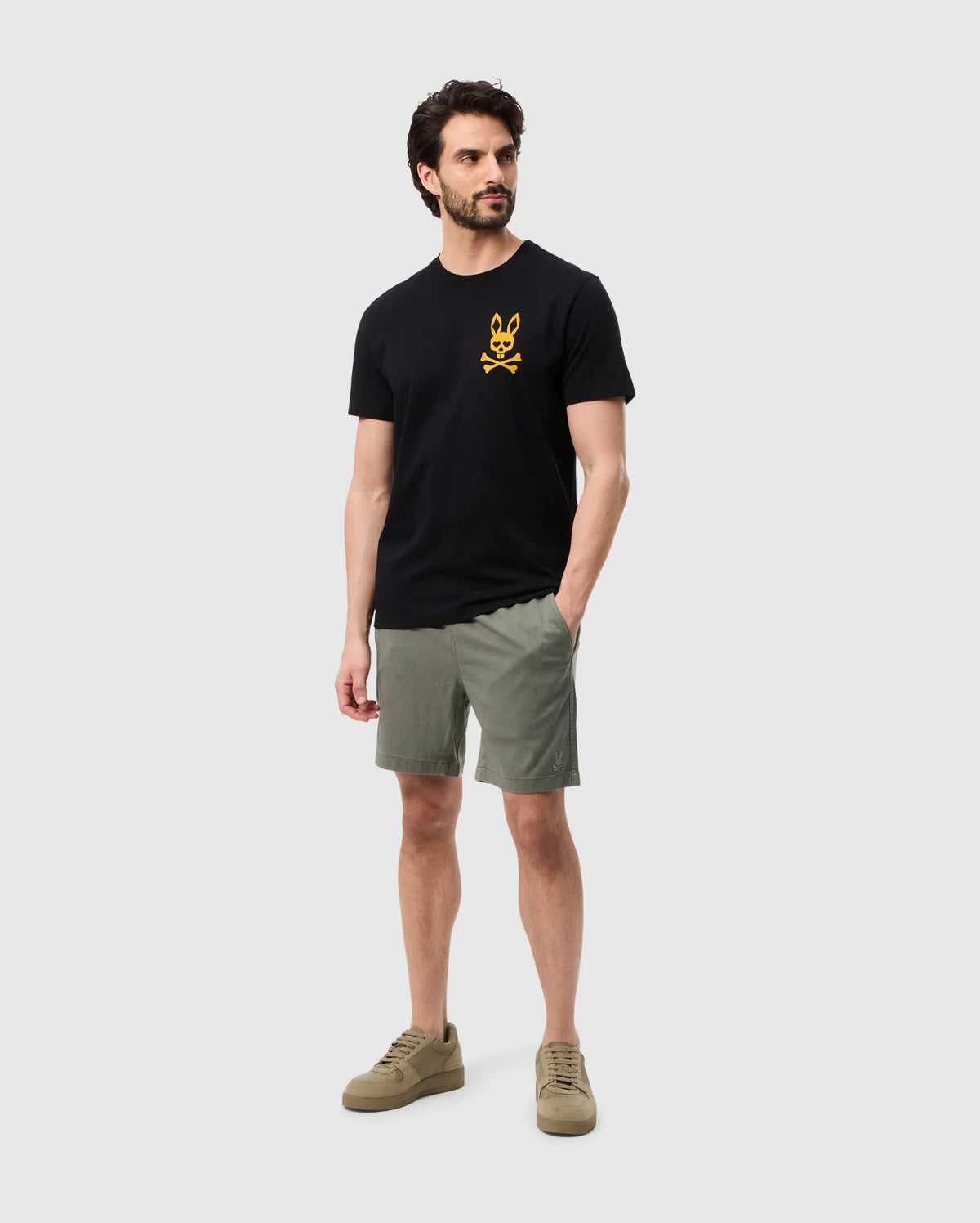 Head to toe view of a model wearing the pima cotton las vegas city tee
