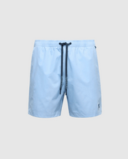 The Psycho Bunny MENS SAMOS swim trunks are light blue with a black drawstring and a small logo on the lower left leg. Made with hydrochromic technology, they feature an elastic waistband and smooth fabric against a plain gray background.