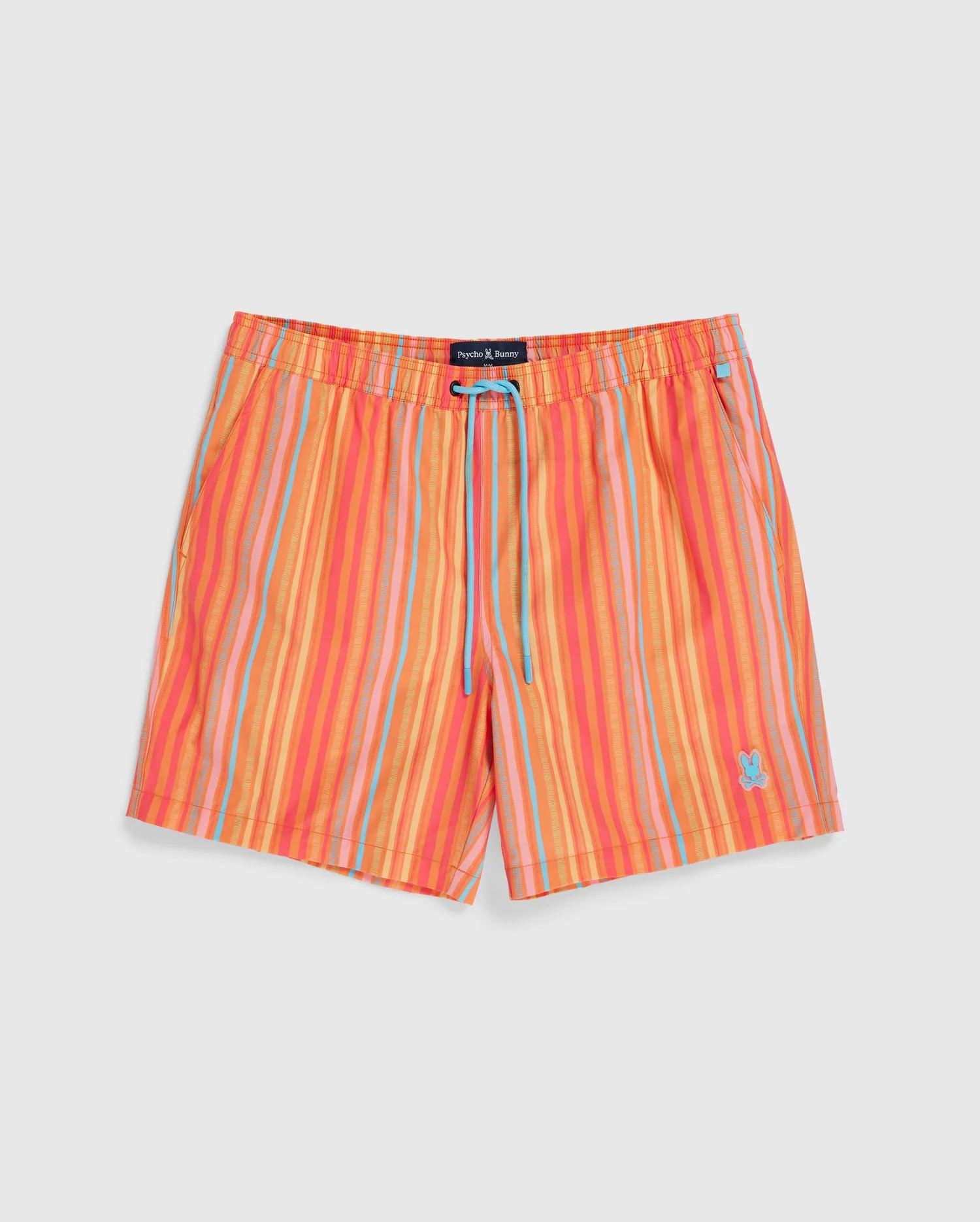 A pair of vibrant, quick-dry swim trunks with orange, pink, and yellow horizontal stripes. The shorts feature an elastic waistband with a blue drawstring and a small embroidered bunny logo on the lower right leg. Perfect for summer fun, they come with a matching waterproof bag for easy storage. Introducing the MENS ANTON ALL OVER PRINT SWIM TRUNK - B6W542C200 by Psycho Bunny.