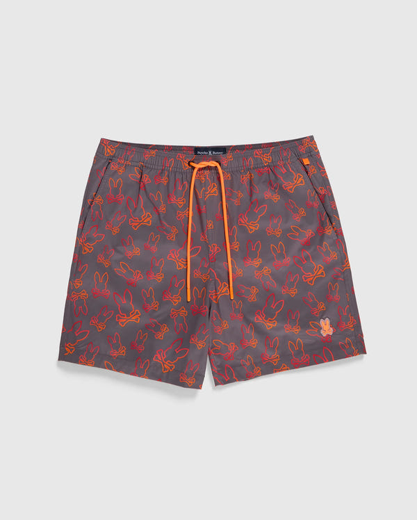 The MENS SHELDON ALL OVER PRINT SWIM TRUNK - B6W588C200 by Psycho Bunny features a gray design with a red and orange bunny pattern, accented by an orange drawstring at the waist. Crafted from quick-dry fabric, these swim trunks perfectly blend functionality and style.