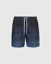 Introducing the Psycho Bunny MENS BENDIGO ALL OVER PRINTED SWIM TRUNK in black with a light blue geometric pattern, matching drawstring waist, subtle logo near the hem, and a sleek light gray background for an upgraded swimwear look.