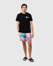 head to toe view of a model wearing the tyler print swim trunk