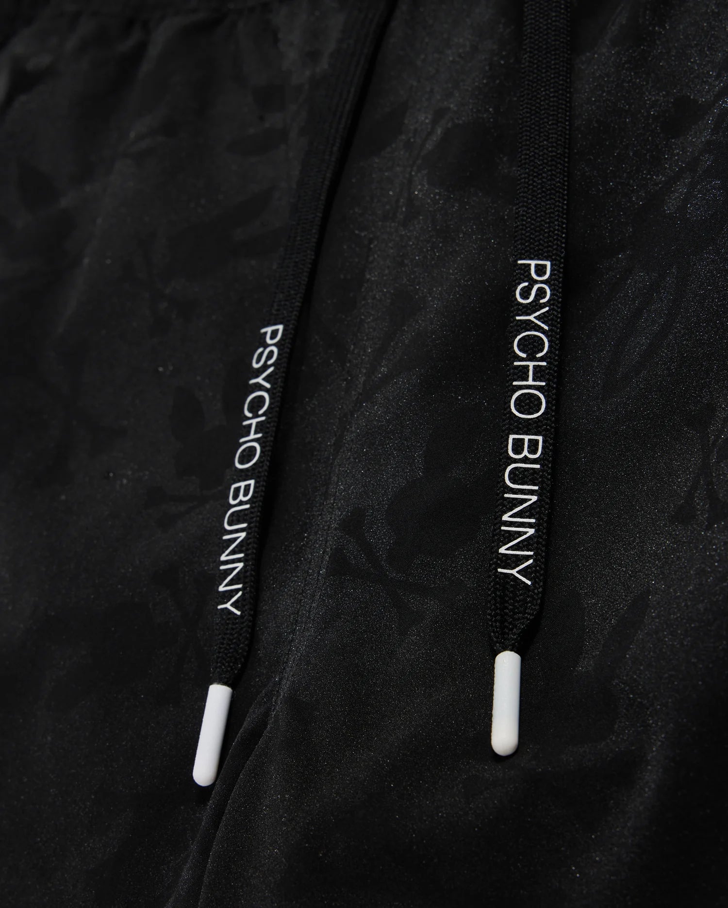 drawstring detail of parker hydrochromic swim trunk