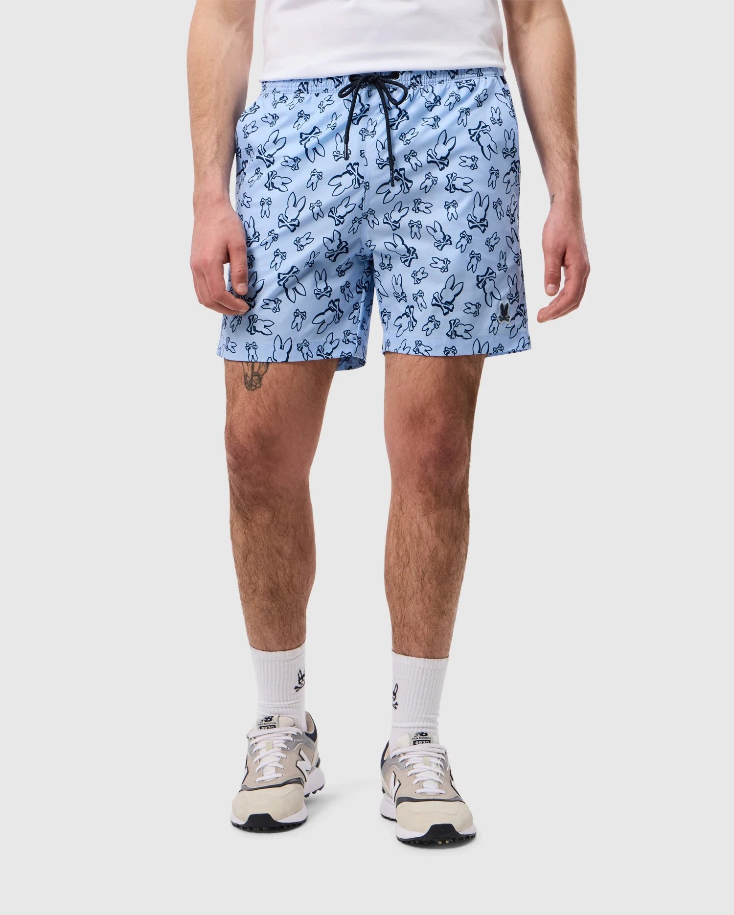 Male model wearing men's rendon print swim trunk in windsurfer