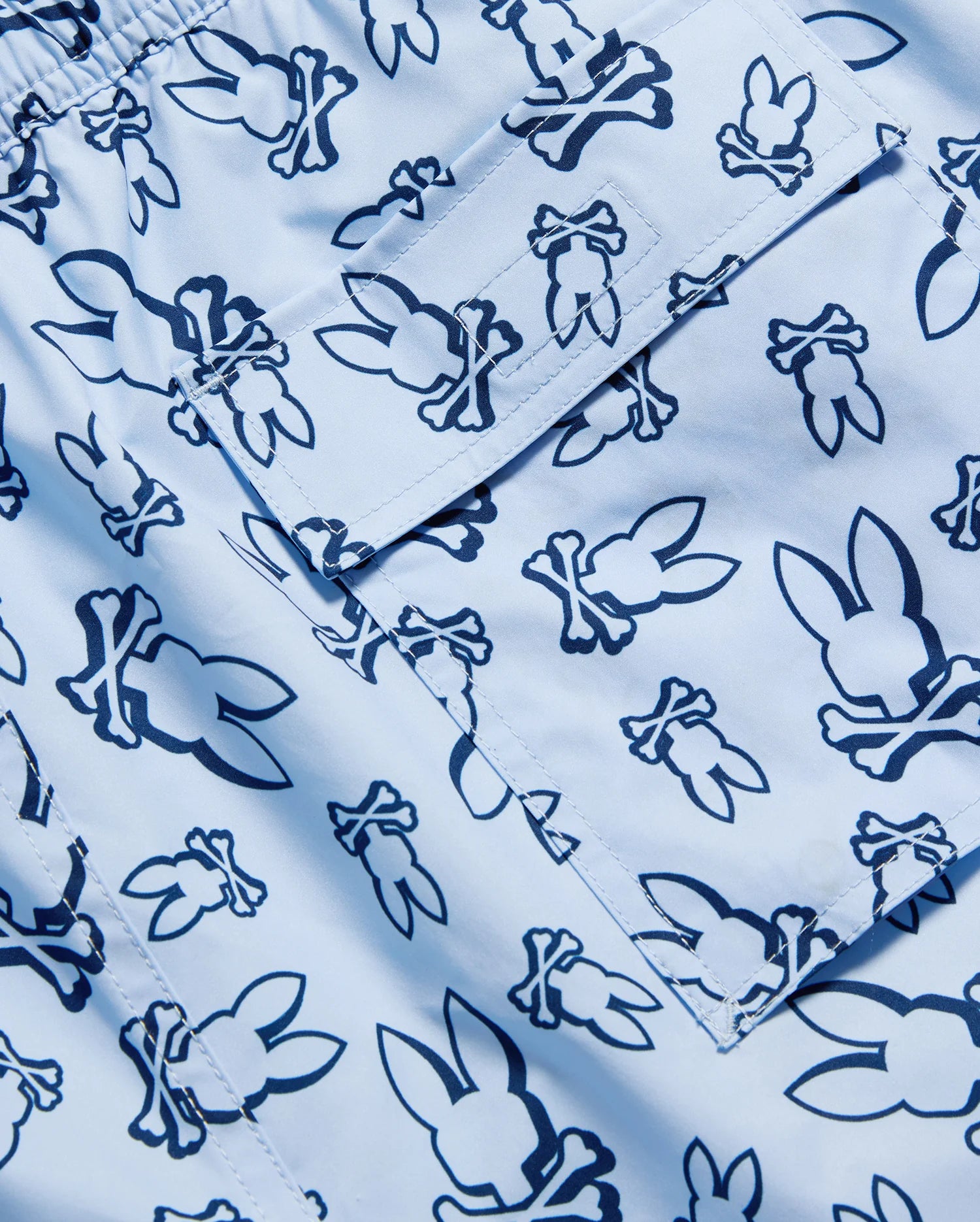 Pocket detail of rendon print swim trunk
