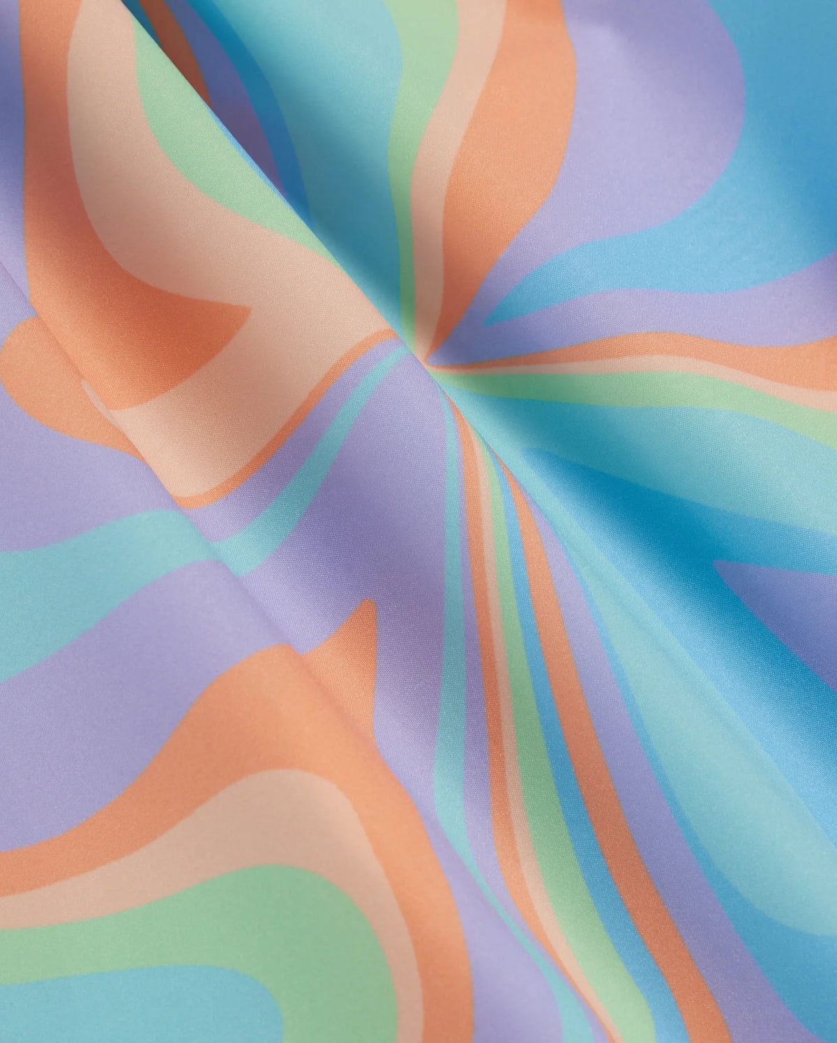 A close-up of Psycho Bunny MENS BLOOMINGTON SWIM TRUNK - B6W941A2PO with a colorful, psychedelic pattern. The design features wavy, swirling shapes in shades of orange, light blue, turquoise, and green on a blue background, creating a dynamic and vibrant visual effect. The fabric appears smooth and glossy.