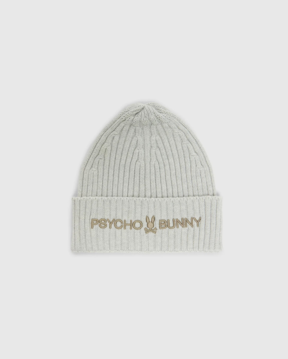 The MENS BEANIE AND SCARF BOX SET - B6X353E200 by Psycho Bunny includes a light gray ribbed beanie with "Psycho Bunny" and a bunny logo embroidered in gold on the folded brim. Crafted from premium 100% cotton, it provides both warmth and style.