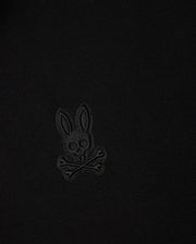 Made from soft Pima cotton, the BIG AND TALL MALTON PIQUE POLO SHIRT by Psycho Bunny features a skull and crossbones with rabbit ears in black stitching for a minimalist vibe, reflecting the timeless style of their Malton polo.