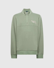 The Psycho Bunny Men's Big and Tall Desert 1/4 Mock Zip - B9S488F200 is a light green cotton jersey sweatshirt featuring long sleeves, a high collar, an embroidered wordmark logo, and a small graphic on the upper left chest. It has a relaxed fit with a half-open zipper.